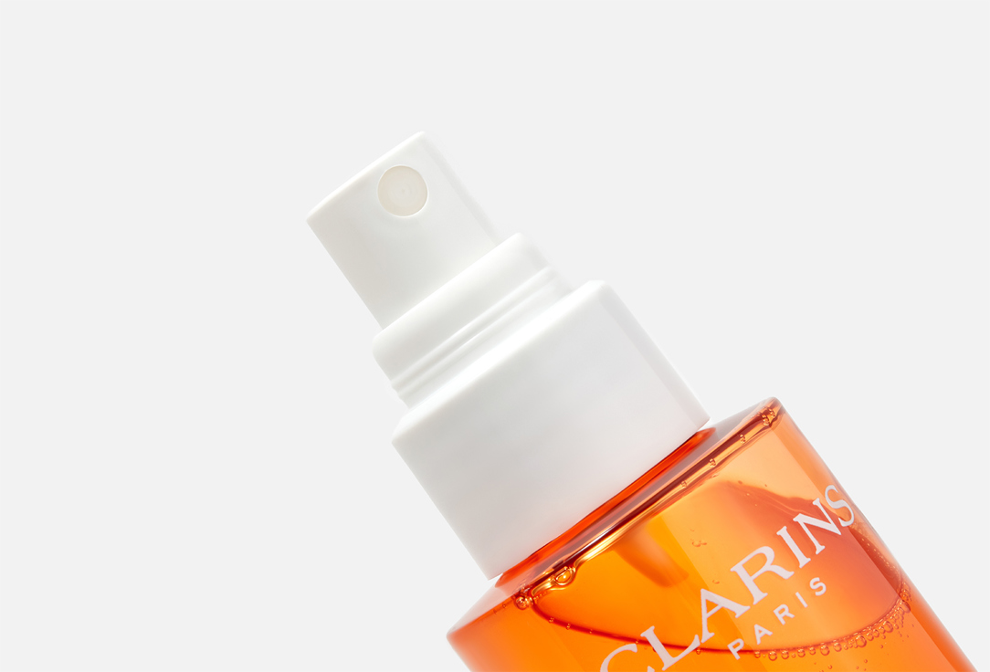 Clarins Body Spray SPF50+ Glowing Sun Care Mist 150 ml Clarins Body Spray SPF50+ Glowing Sun Care Mist